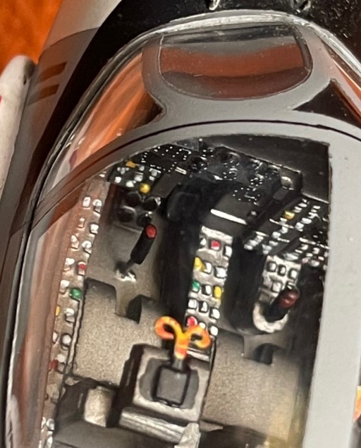 Marine A‑6A Intruder model cockpit with detailed panels, switches, and dual control sticks in painted interior