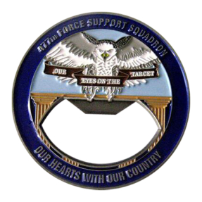 completed challenge coin in rich detail and color. you can see the texture of feathers embossed with an insignia banner that reads 'Our Eyes on the Target'