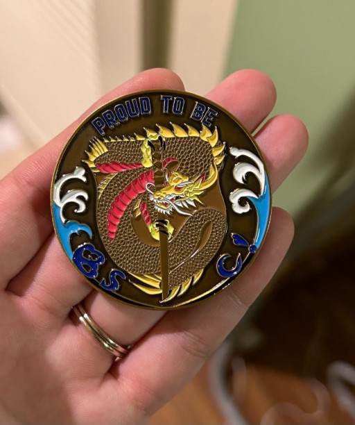 Custom challenge coin with dragon design symbolizing pride and tradition