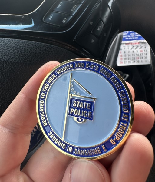 State Police challenge coin honoring service and dedication beyond the military