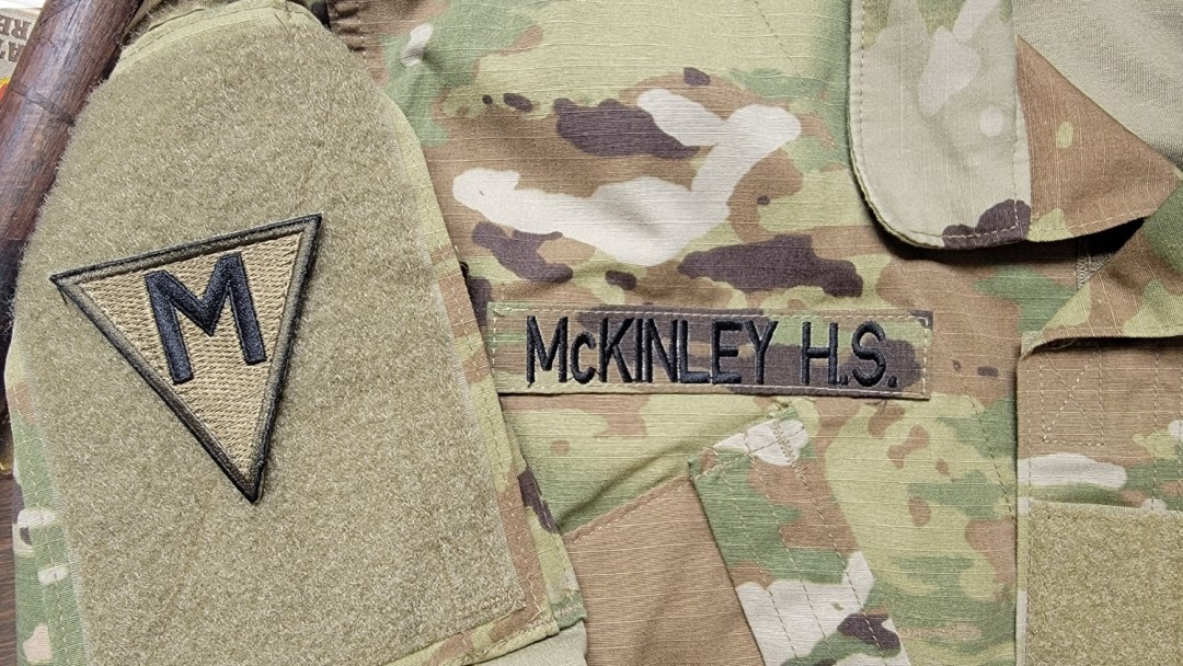 McKinley High School JROTC OCP patch on uniform symbolizing pride, identity, and accomplishment