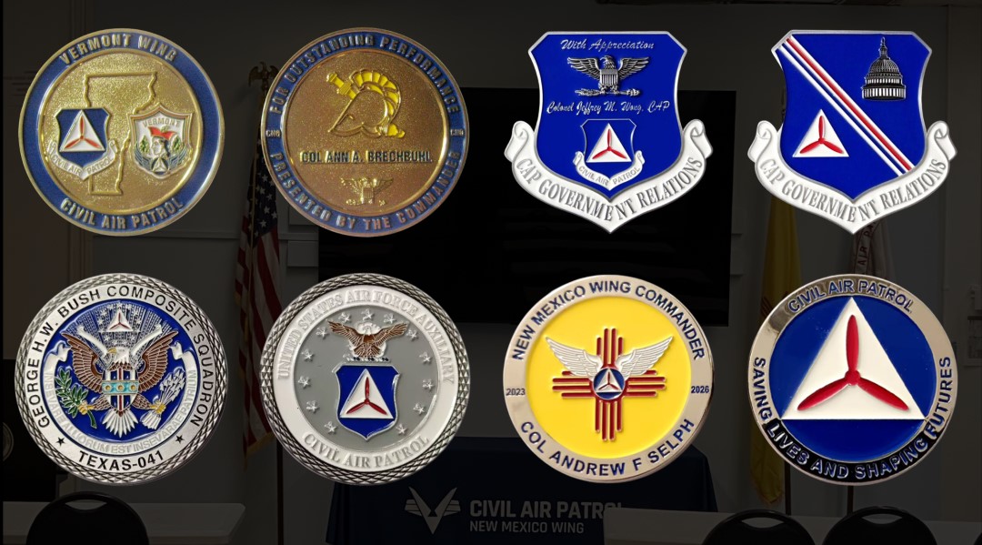 Civil Air Patrol challenge coin collection featuring Vermont, Texas, New Mexico, and national CAP designs symbolizing tradition, service, and achievement