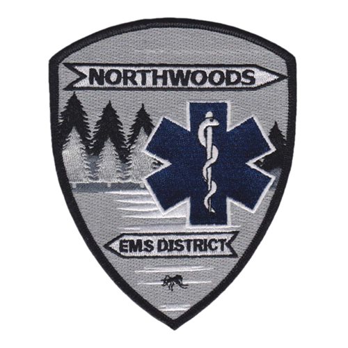 Northwoods EMS District embroidered patch with Star of Life symbol and forest background.