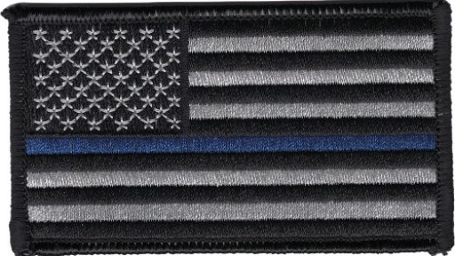 Thin Blue Line American flag patch symbolizing law enforcement courage, sacrifice, and unity