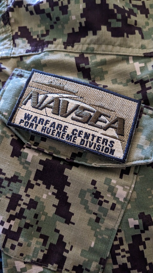 NSWC NAVSEA Port Hueneme MK41 NWU Type III patch on Navy uniform with text Warfare Centers Port Hueneme Division