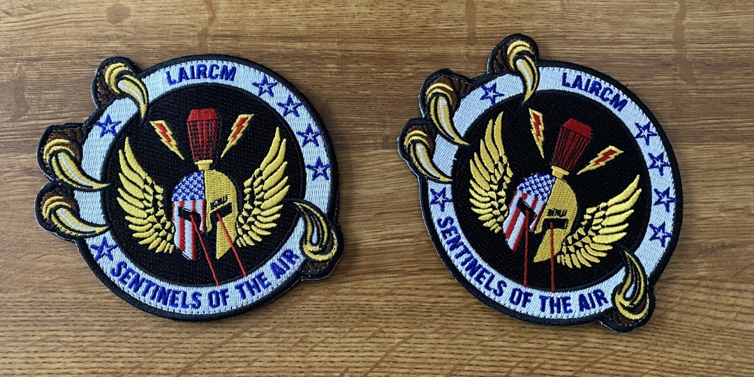 Air Force Life Cycle Management Center WNY LAIRCM embroidered patch displayed on a surface