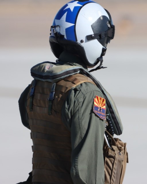 AZA Spotters patch displayed on a flight suit shoulder
