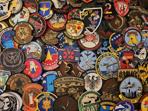 A collection of assorted military patches displayed together