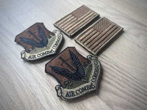 Air Combat Command OCP patch and USA OCP Spice Brown Flag patches on camouflage uniform