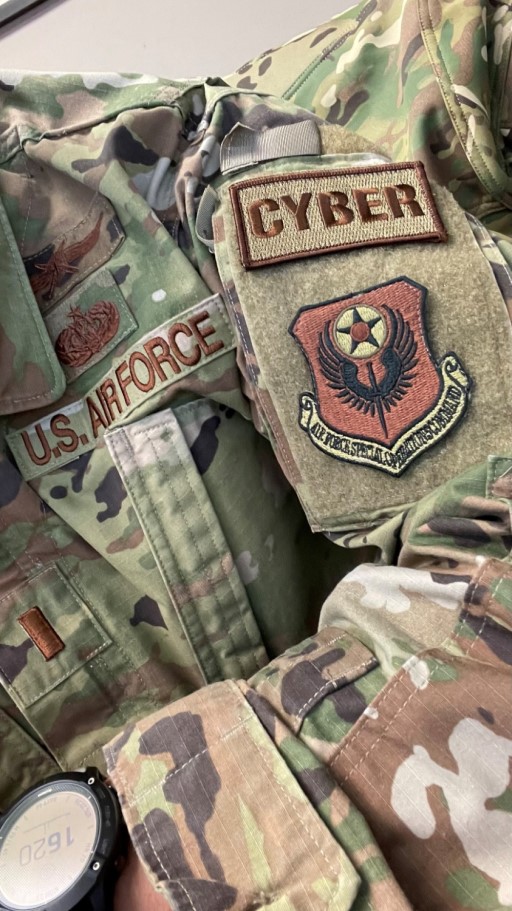 CYBER Duty Identifier OCP patch and Air Force Special Operations Command OCP patch on camouflage uniform
